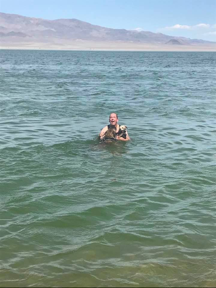 This image has an empty alt attribute; its file name is rv-walker-lake-me-and-pepe-and-duke-in-water.jpg