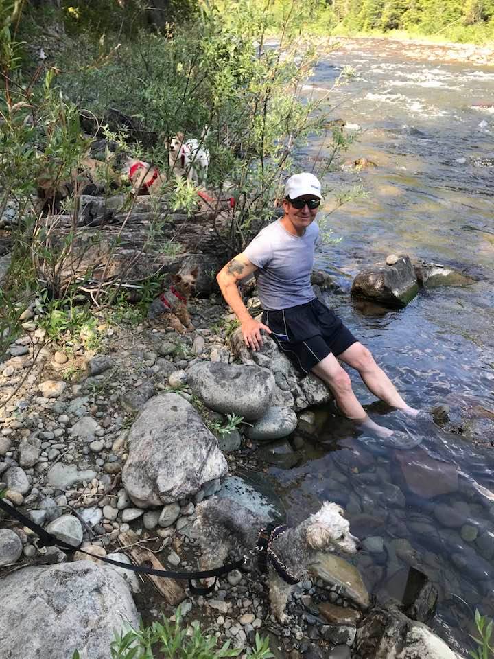 This image has an empty alt attribute; its file name is rv-july-6-me-in-river.jpg